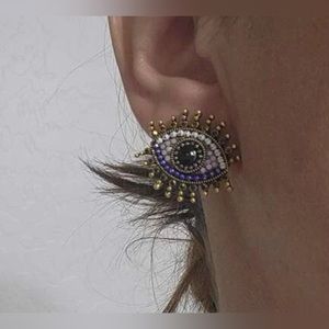 Eye decor earrings